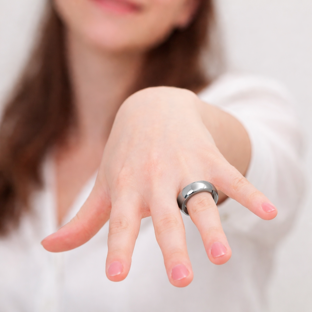 Smart Ring displayed on a hand, showcasing its sleek design and stylish look as a functional wearable technology.